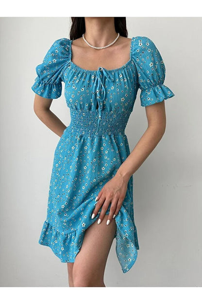 Kayık Yaka Çiçek Desenli Bürümcük Mini Elbise – Mavi